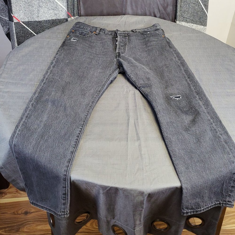 Levi’s black 501 93 manufacture distressed jeans, size 34